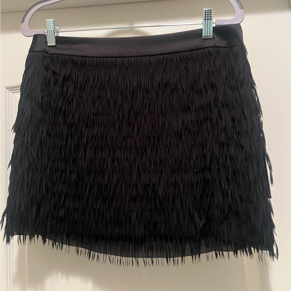 Black short fringe skirt from Express